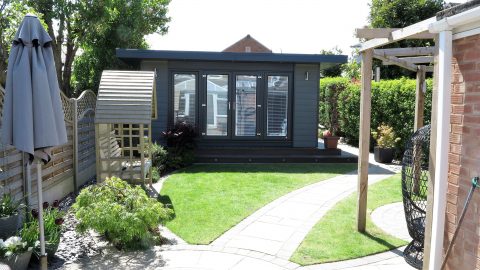 Sunny view showing garden and outdoor office