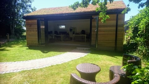 Cedar Garden Office with Sedums Roof by The Green Room