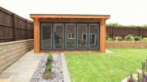 Western Red Cedar Garden Building with Slide and Pivot Aluminium Doors