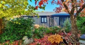 Granny Annexe in an Autumn garden. Get a no obligation quote today.